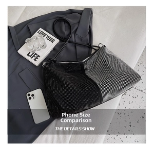 Detailed shot of sparkling rhinestone tote bag with a black and white contrast design