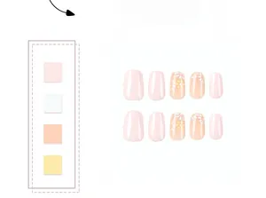 Detail of short pink press-on nails with hand-painted tricolor daisy floral patterns