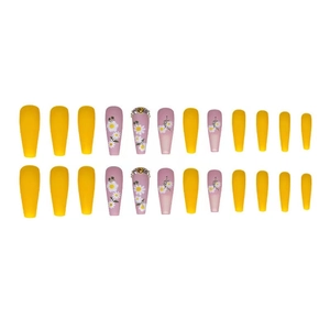 Long press-on nails set with yellow and pink colors featuring daisy patterns and rhinestones