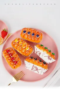 Detailed macro view of realistic PU squishy cupcake models with mixed fruit toppings