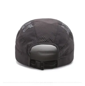 Close-up of quick-dry gray outdoor cap featuring breathable laser-cut holes and adjustable strap