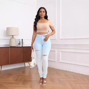 Jean taille haute dégradé bleu et blanc avec détails déchirés aux genoux pour femme