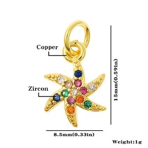 Detailed view of a gold starfish pendant made of copper and zircon with 15mm dimensions