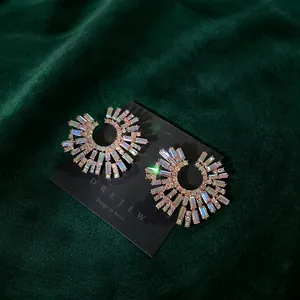 Iridescent sunburst earrings with colorful crystals on a gold-plated base for women