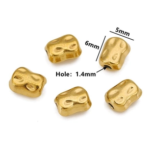 Macro view of irregular golden baroque beads with 5mm and 6mm size annotations for DIY jewelry