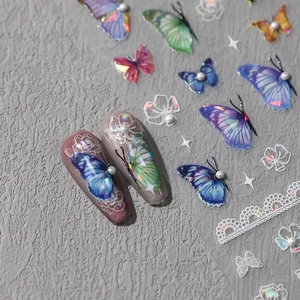 3D laser holographic nail art stickers with bow knots, pearls, and butterfly designs