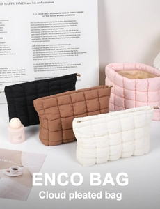 Quilted pleated cloud makeup bags in black, brown, white, and pink nylon material