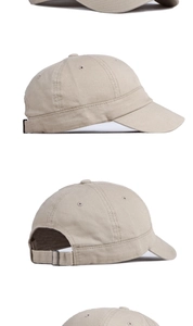 Detail view of khaki cotton canvas baseball cap with adjustable metal buckle back strap