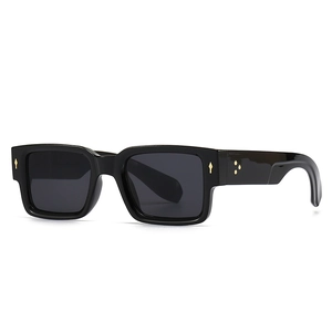 Classic square black sunglasses for women with gold star rivets and dark lenses