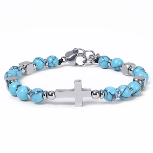 Detail of Amazonite stone beads and stainless steel cross charm on a stylish bracelet