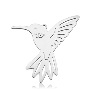 Detailed close-up of a silver hummingbird pendant made of stainless steel with cutout