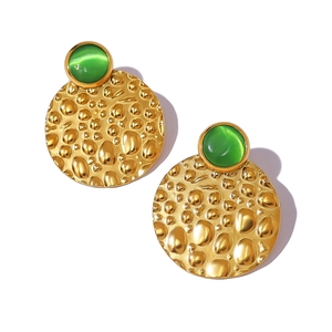 French vintage hammered gold earrings with green cat eye stones for a classic look