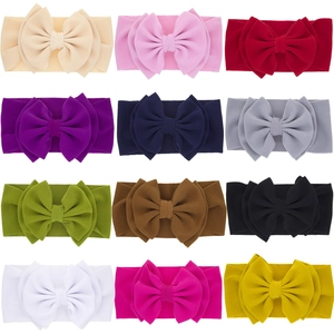 Set of 12 waffle texture elastic baby headbands with large bows in assorted colors