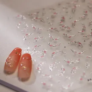 Vue détaillée d'autocollants 3D pour ongles dégradé rose avec texture gel et lune