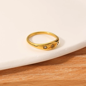 French vintage 18k gold plated ring featuring white zircon stones and star engravings