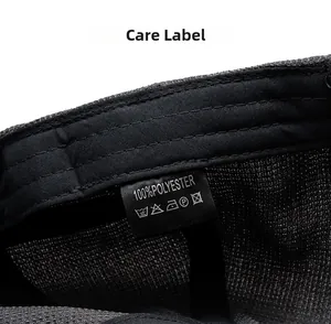 Detailed view of the interior care label and washing instructions for the polyester flat cap