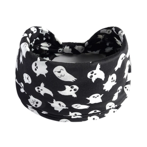 Close-up of black yoga headband with white cartoon ghost patterns for Halloween theme