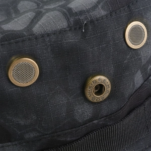 Detail of dark camouflage tactical hat showing ripstop fabric and metal ventilation eyelets