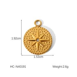Detailed view of a gold-plated starburst pendant with dimensions 1.92cm by 1.53cm