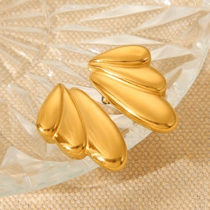 Elegant 18k gold-plated stainless steel wing stud earrings on a textured background