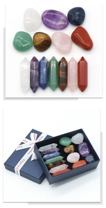 Chakra healing set with 7 tumbled stones and 7 hexagonal crystal pillars in a blue gift box