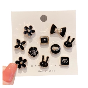 9-piece black enamel and gold floral brooch set with pearls and rhinestones