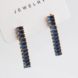 Elegant long drop earrings with navy blue rectangular crystals and gold metal base