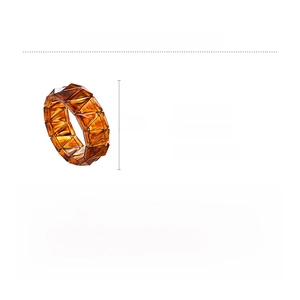 Detail view of amber tortoise shell acrylic geometric bracelet with 7cm diameter specs
