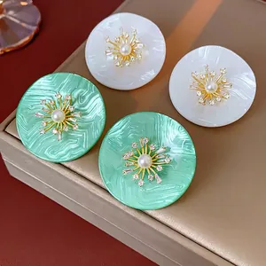 Baroque style pearl and zircon round earrings in mint green and pearlescent white