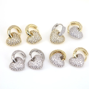 Set of four pairs of heart-shaped copper earrings with micro-pave cubic zirconia crystals
