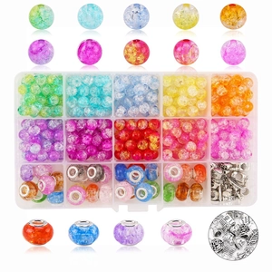 Detailed close-up of 15-grid jewelry kit with colorful crackle beads and alloy charms