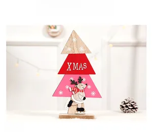 Detailed view of 3-tier wooden Christmas tree stand with reindeer and XMAS text