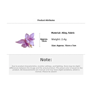 Detail showing dimensions of purple fabric hibiscus flower hair clip at 10cm x 7cm