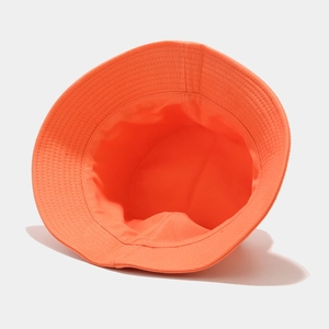 Classic orange cotton bucket hat shown from an inner top view with detailed stitching