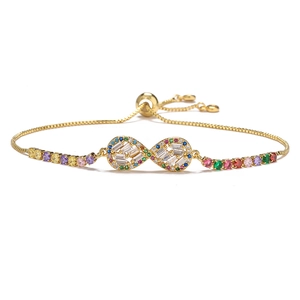 18K gold-plated infinity bracelet with multicolored stones and cubic zirconia on white background