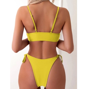 Back view of yellow two-piece bikini with butterfly print and side-tie swimming bottoms