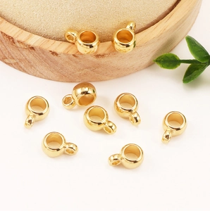 Détail de perles d'espacement CCB dorées avec anneau pour création de bijoux DIY