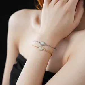 Modern Ruyi hollowed-out gourd bracelet set with zircon in silver and gold finish