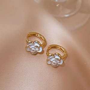 Elegant gold plated camellia flower earrings with white petals and pearls for women