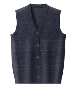 Detail of navy blue argyle knit sweater vest featuring V-neck and button closure