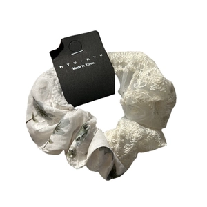 Lace floral scrunchie with a detachable bow ribbon and gray botanical prints