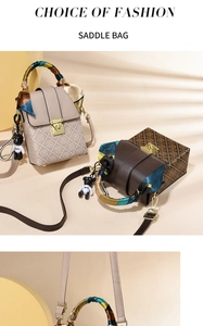 Close-up of stylish mini saddle bags with silk scarves and bear charms on display
