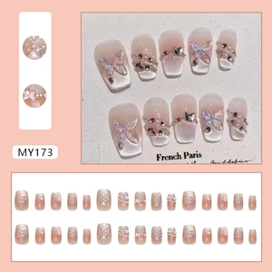 French cat eye press-on nails with 3D butterflies and crystals on gradient pink base