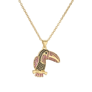 Elegant gold plated toucan pendant necklace with pink and black cubic zirconia stones