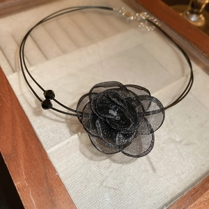 Double-layer dark gothic choker featuring a black lace mesh rose and faceted crystal beads