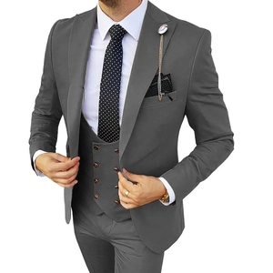 Slim fit three-piece dark grey business suit with matching vest and classic polka dot tie