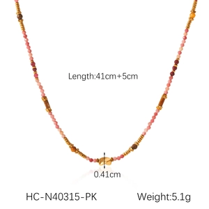 Detail shot of colorful stone beaded necklace with irregular gold pendant and size specs