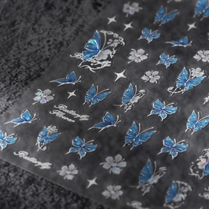 Holographic butterfly and white flower nail art stickers with laser finish on dark base