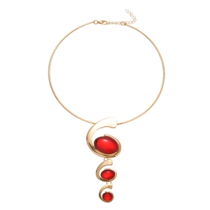 Minimalist gold metal collar necklace with spiral pendant and red resin stones on white background