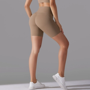 Detail of high-waisted seamless yoga shorts showing the squat-proof fabric and butt-lift fit